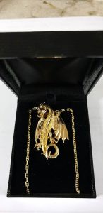 Dragon Or jaune, yeux rubis, en pendentif,